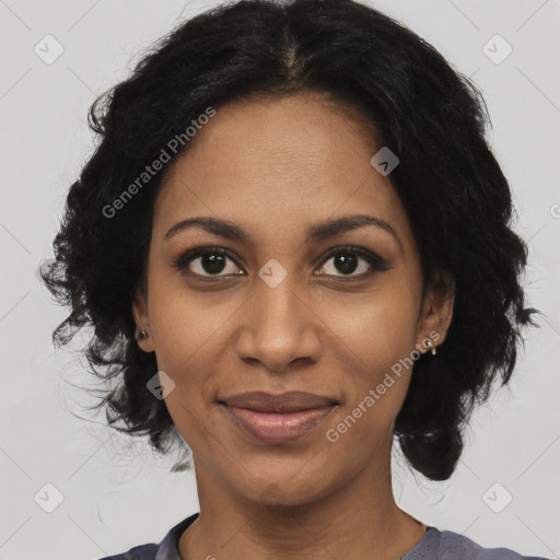 Joyful black adult female with short  black hair and brown eyes