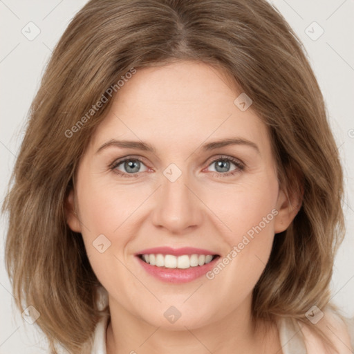 Joyful white young-adult female with medium  brown hair and green eyes