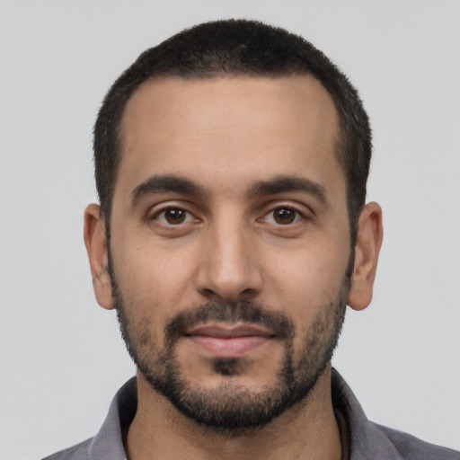 Neutral latino young-adult male with short  black hair and brown eyes