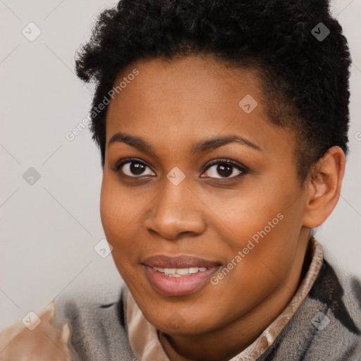 Joyful black young-adult female with short  brown hair and brown eyes