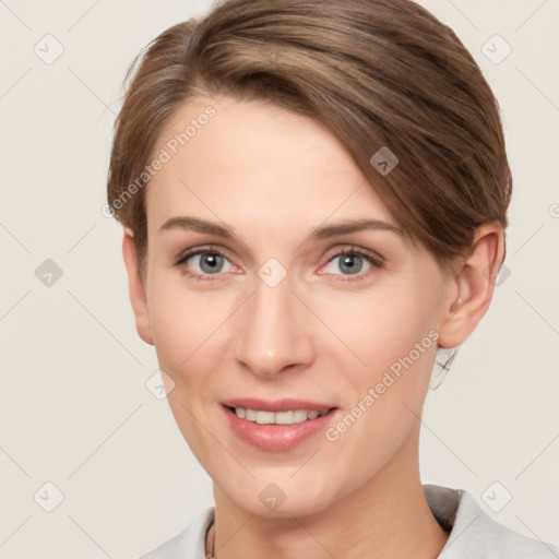 Joyful white young-adult female with short  brown hair and grey eyes