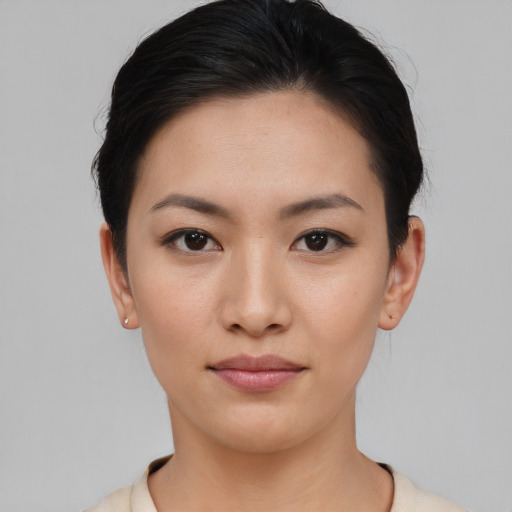 Neutral asian young-adult female with short  brown hair and brown eyes