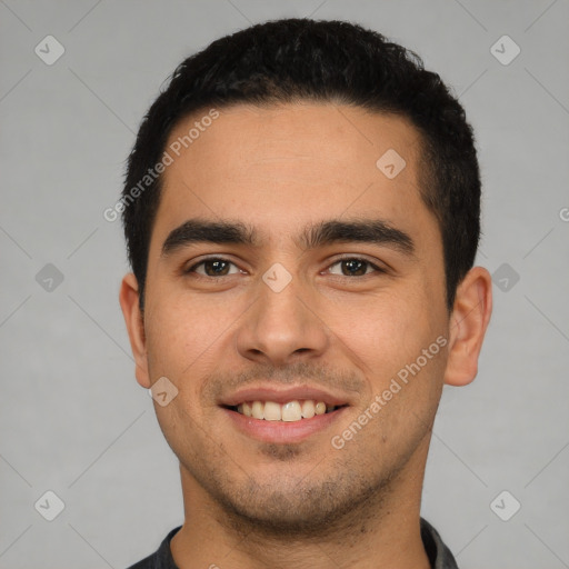 Joyful latino young-adult male with short  brown hair and brown eyes