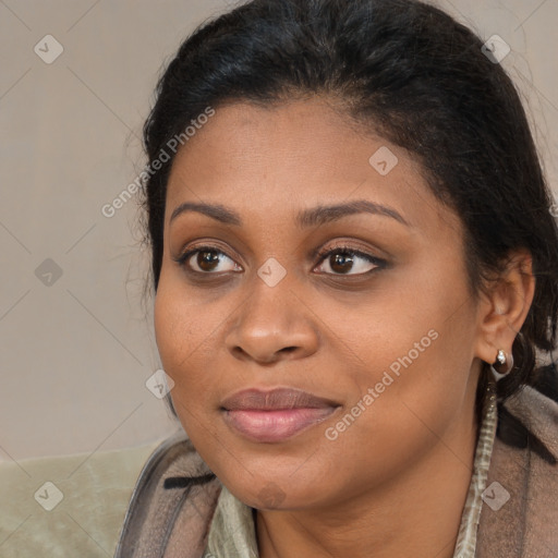 Joyful latino young-adult female with medium  brown hair and brown eyes