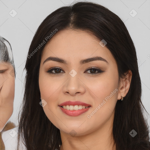 Joyful asian young-adult female with long  brown hair and brown eyes