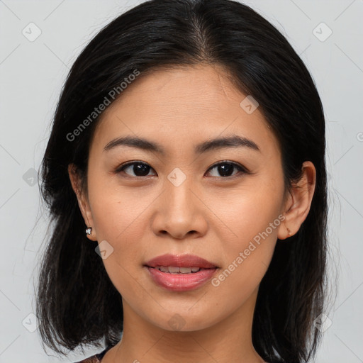 Joyful asian young-adult female with medium  brown hair and brown eyes