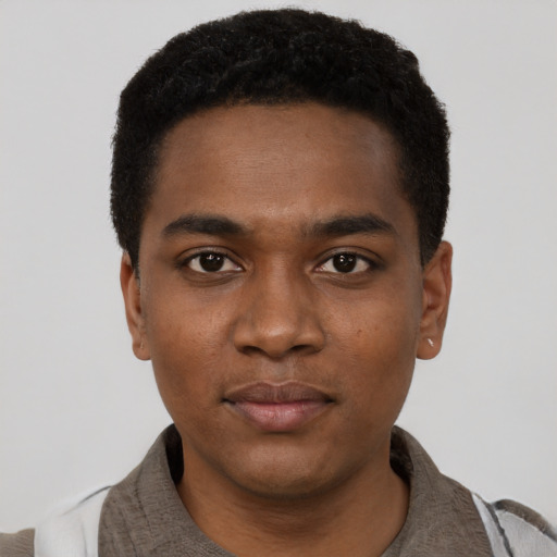 Neutral black young-adult male with short  black hair and brown eyes