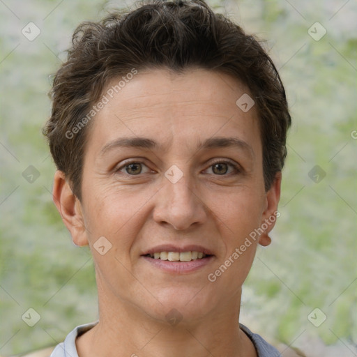 Joyful white adult female with short  brown hair and brown eyes