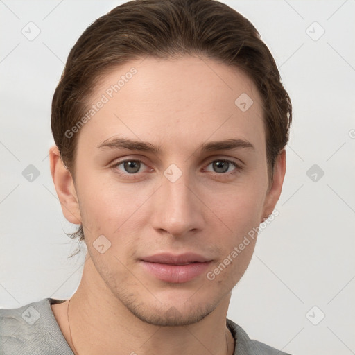 Joyful white young-adult female with short  brown hair and grey eyes