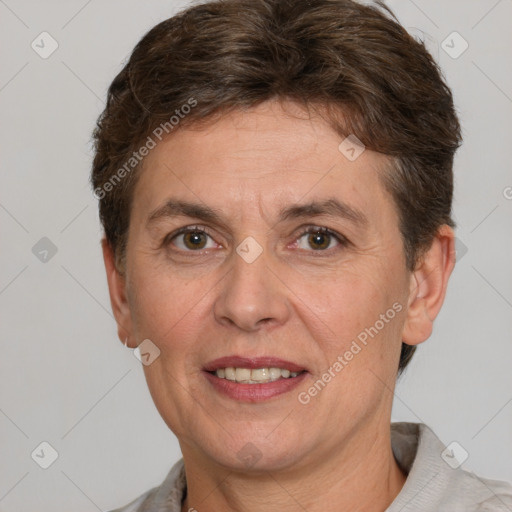 Joyful white adult female with short  brown hair and brown eyes