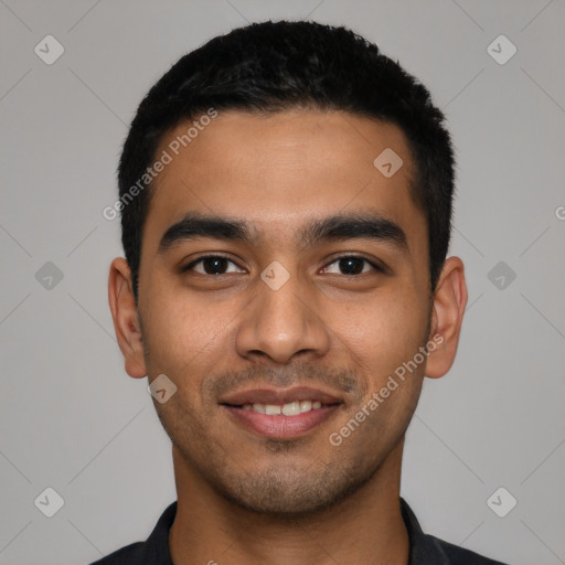 Joyful latino young-adult male with short  black hair and brown eyes