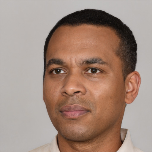 Neutral black young-adult male with short  black hair and brown eyes