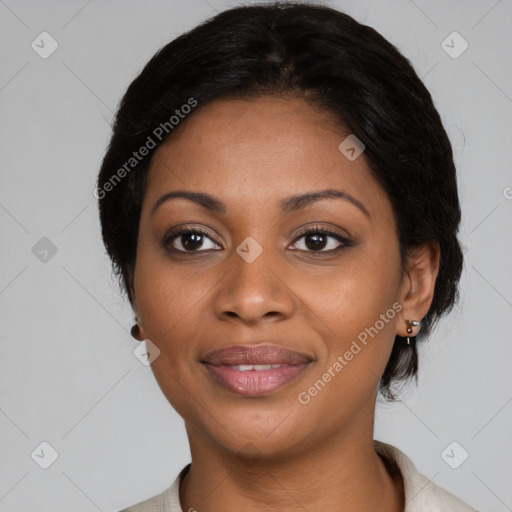 Joyful black young-adult female with medium  black hair and brown eyes