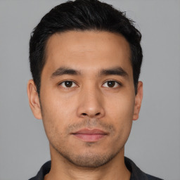 Neutral asian young-adult male with short  black hair and brown eyes