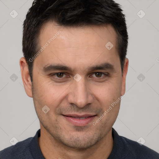 Joyful white adult male with short  brown hair and brown eyes