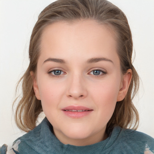 Joyful white young-adult female with medium  brown hair and blue eyes