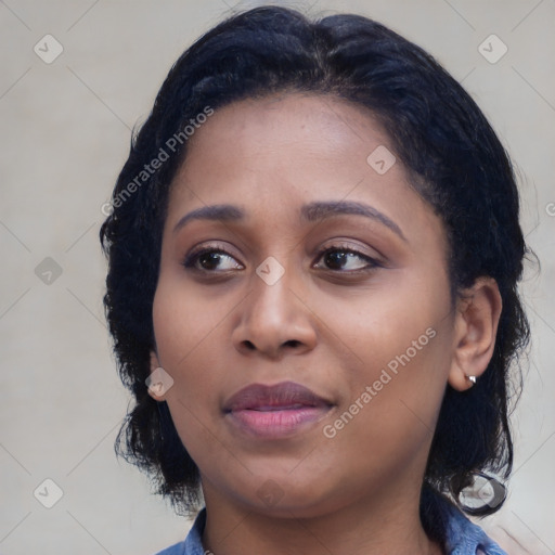 Joyful asian young-adult female with medium  black hair and brown eyes