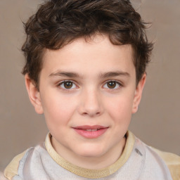 Joyful white child male with short  brown hair and brown eyes