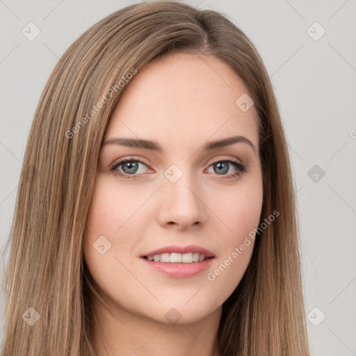 Joyful white young-adult female with long  brown hair and green eyes