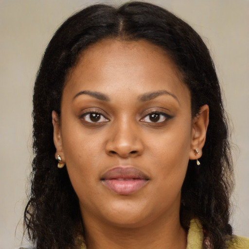 Neutral black young-adult female with long  brown hair and brown eyes
