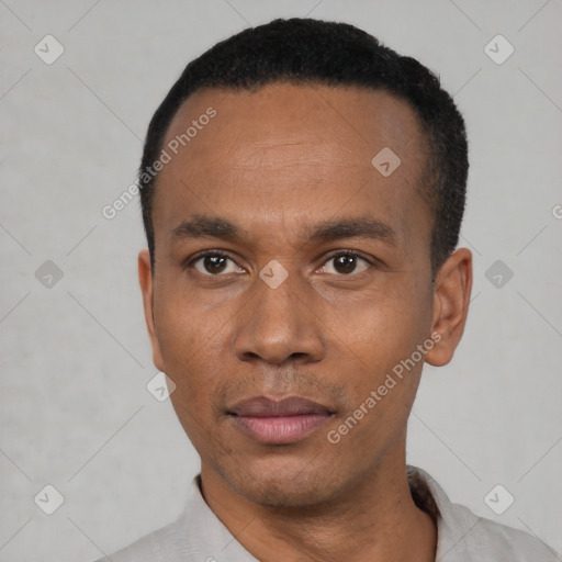 Neutral latino adult male with short  black hair and brown eyes