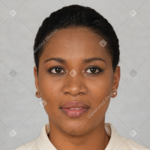 Joyful black young-adult female with short  black hair and brown eyes