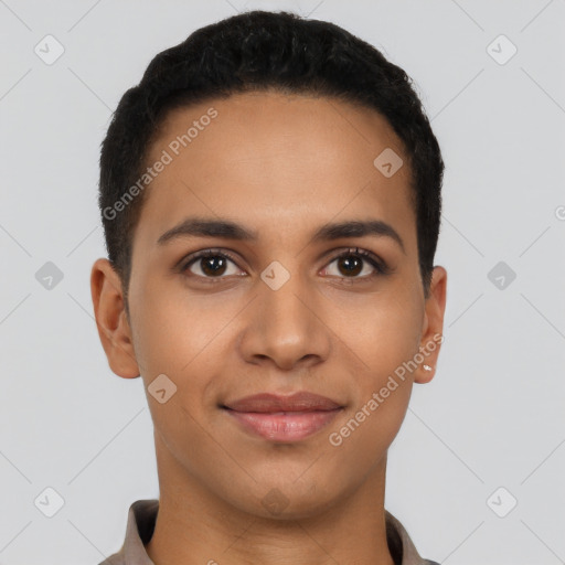 Joyful latino young-adult male with short  brown hair and brown eyes