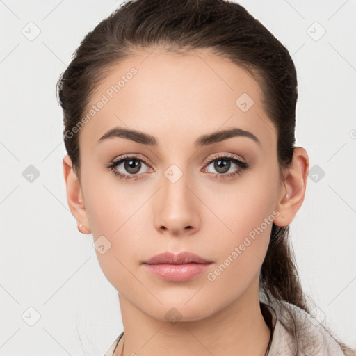 Neutral white young-adult female with long  brown hair and brown eyes