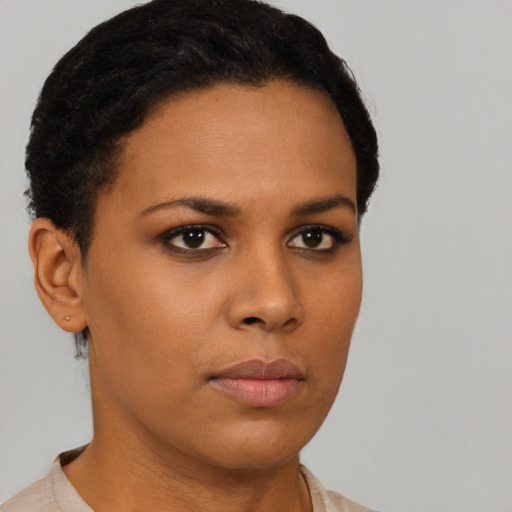 Neutral black young-adult female with short  black hair and brown eyes