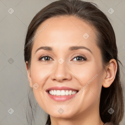 Joyful white young-adult female with medium  brown hair and grey eyes