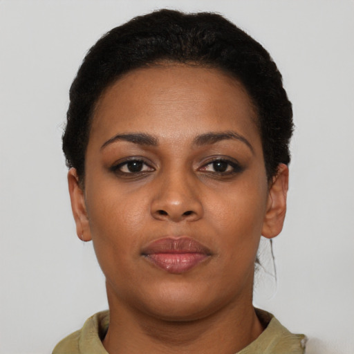 Neutral black young-adult female with short  brown hair and brown eyes