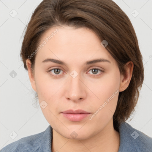 Neutral white young-adult female with medium  brown hair and grey eyes