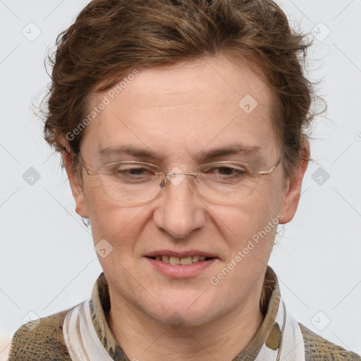 Joyful white adult female with short  brown hair and grey eyes