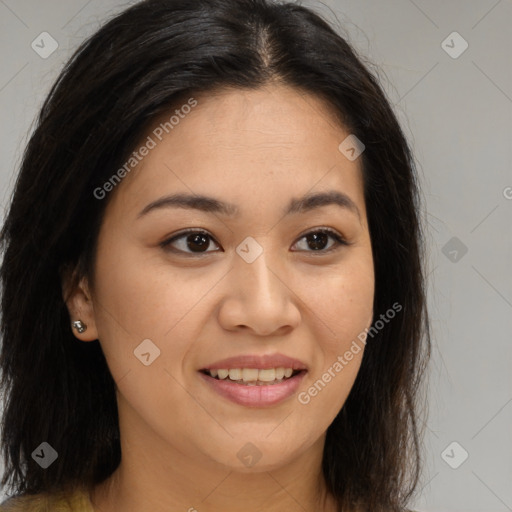 Joyful asian young-adult female with long  brown hair and brown eyes