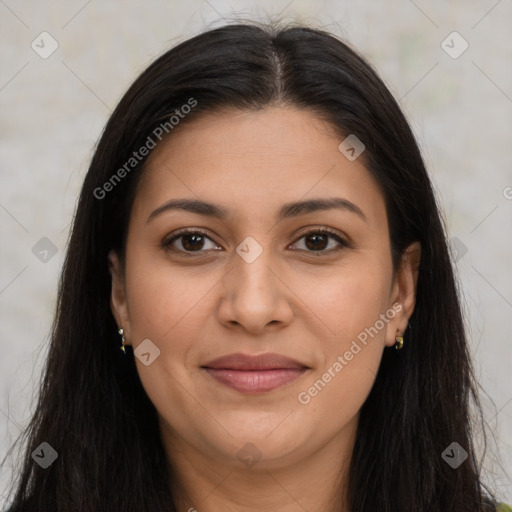 Joyful latino young-adult female with long  brown hair and brown eyes