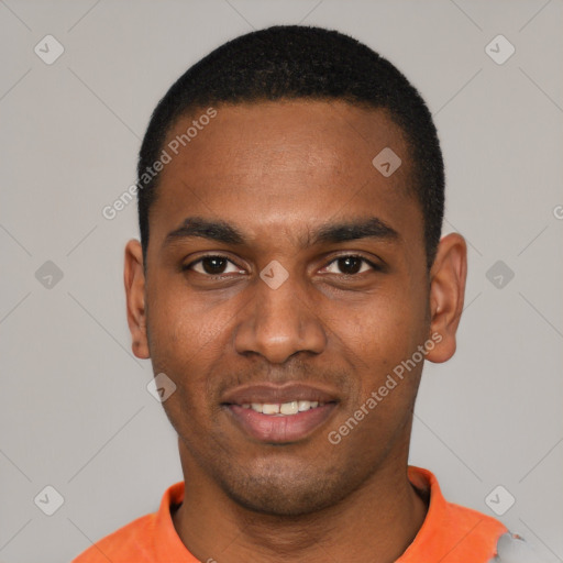 Joyful black young-adult male with short  black hair and brown eyes