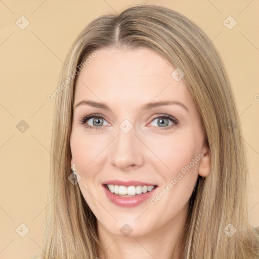 Joyful white young-adult female with long  brown hair and green eyes