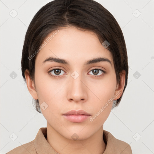 Neutral white young-adult female with short  brown hair and brown eyes