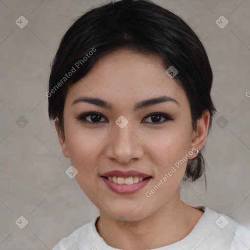 Joyful asian young-adult female with short  black hair and brown eyes