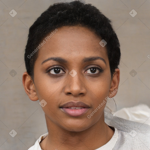 Joyful black young-adult female with short  black hair and brown eyes