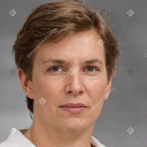 Joyful white adult female with short  brown hair and grey eyes