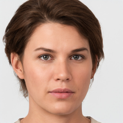 Neutral white young-adult female with short  brown hair and brown eyes