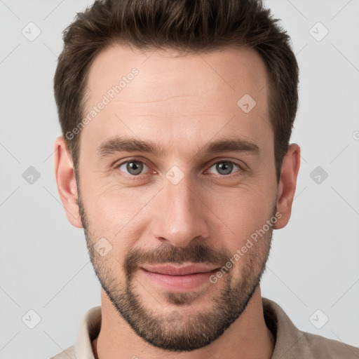 Joyful white young-adult male with short  brown hair and brown eyes