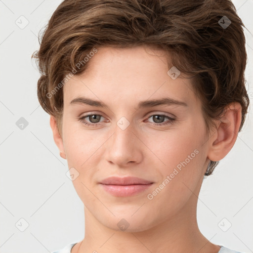 Joyful white young-adult female with short  brown hair and grey eyes