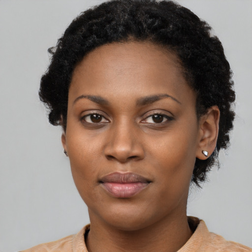 Neutral black young-adult female with short  black hair and brown eyes