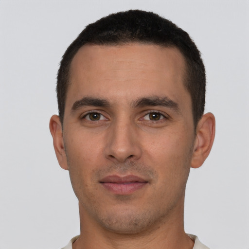 Neutral white young-adult male with short  black hair and brown eyes