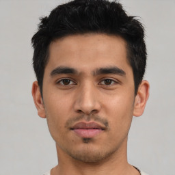 Neutral asian young-adult male with short  black hair and brown eyes