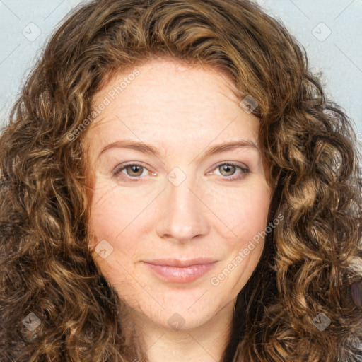 Joyful white young-adult female with long  brown hair and green eyes