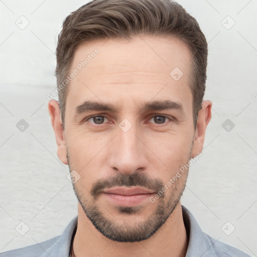 Neutral white young-adult male with short  brown hair and brown eyes