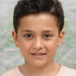 Joyful white child male with short  brown hair and brown eyes